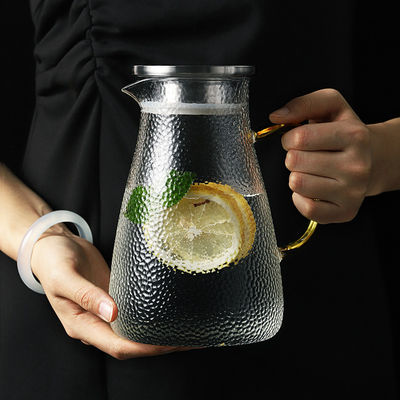 Ronde de Drankwaterkruik van het Handvatglas, Geïsoleerde Hittebestendige Glaswaterkruik met Deksel leverancier