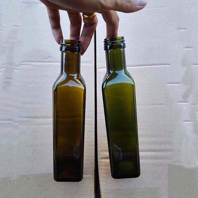 Flessen van de keuken de Buitensporige Olijfolie, de Fles van de Tafelolienevel met Metaaldeksel leverancier