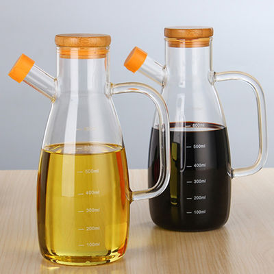 De duidelijke 650ml-Fles van de GlasOlijfolie met Bamboedeksel leverancier